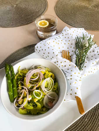 Vegeable salad as breakfast with asparagus and avocadoの写真素材
