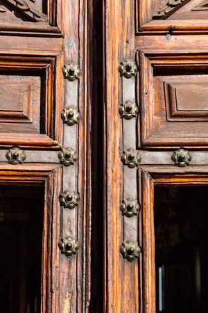 Old wood texture with the woodworm holesの写真素材