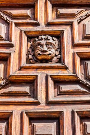 Old wood sculpture with the woodworm holesの写真素材