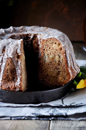 Apple cake with raisins in sugar glazeの写真素材