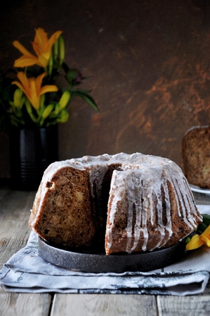 Apple cake with raisins in sugar glazeの写真素材