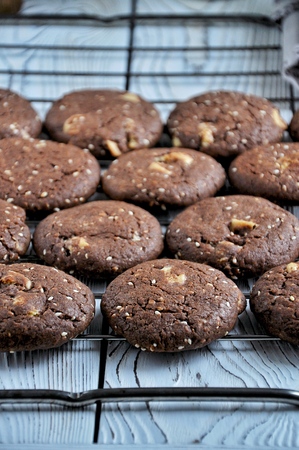 Cookies with cocoa, white chocolate and fried sesame seeds. Close-upの写真素材