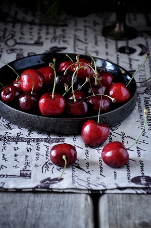 Fresh cherry on a platterの写真素材