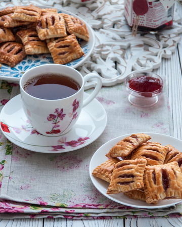 Homemade cookies from puff pastry with strawberry jamの写真素材