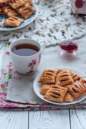 Homemade cookies from puff pastry with strawberry jamの写真素材