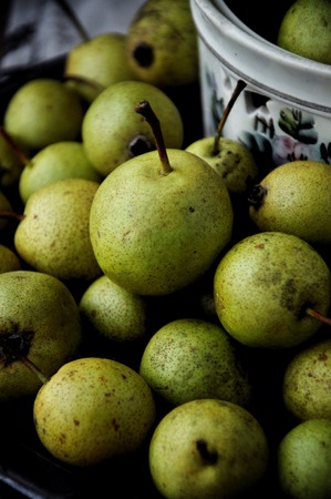 On the table is a pear cropの写真素材