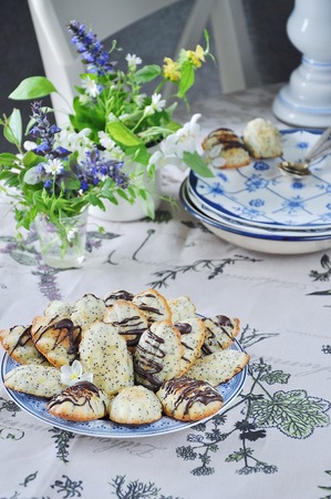 "Madeleine" biscuit cake with poppy seeds. Spring Still Lifeの写真素材