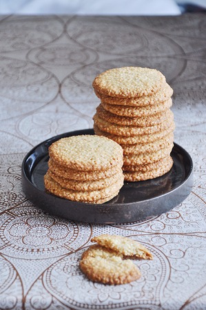 Homemade cookies of flat shape with sesameの写真素材