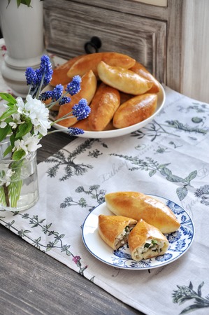 On a platter Russian traditional patties with rice and eggの写真素材