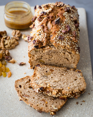 Vegetarian cake with raisins, walnuts and honeyの写真素材