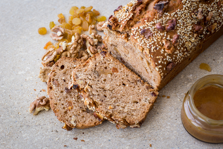 Vegetarian cake with raisins, walnuts and honeyの写真素材