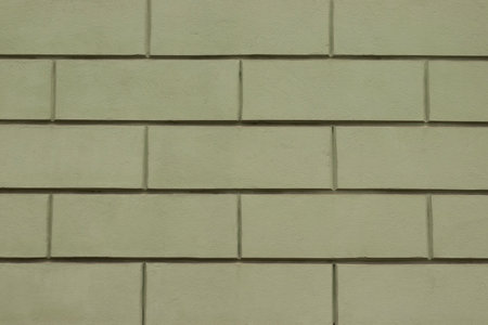 Light green plastered wall with rectangular pattern. High quality photoの写真素材