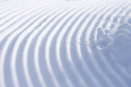 Macro of a freshly groomed ski slope in the morningの写真素材