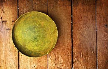 Tray on wooden surface good as background or something similar.の写真素材