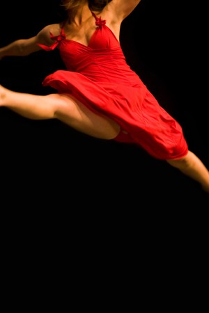 Scene of isolated female dance player on black background. の写真素材