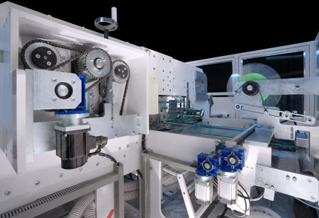 Details of a packaging machine for rolls, serviettes and handkerchiefs.