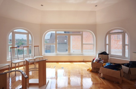 Interior of a new home, empty room with white walls and parquet. の写真素材