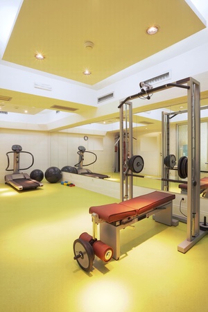 Interior of an empty fitness club with equipment.の写真素材
