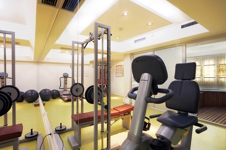 Interior of an empty fitness club with equipment.の写真素材