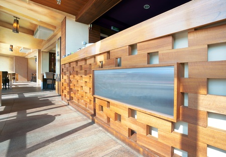 Cafe interior, details of a modern wooden bar. の写真素材