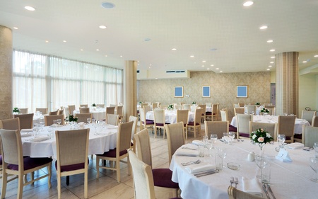 Interior of a restaurant prepared for wedding ceremony. の写真素材