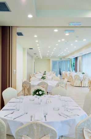 Interior of a restaurant prepared for wedding ceremony. の写真素材