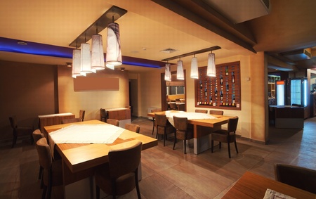 Interior of a modern restaurant, classical design, by night. の写真素材