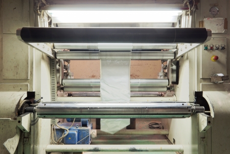 Details of a printing machine inside factory. の写真素材