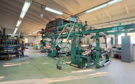 Details of a printing machine inside factory.の写真素材