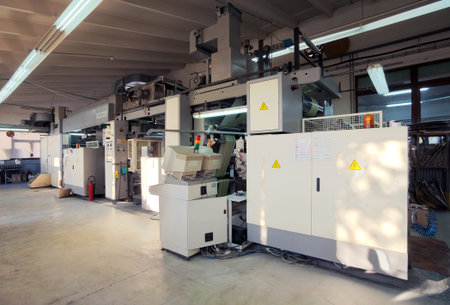 Details of a printing machine inside factory.
