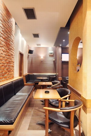 Modern and simple cafe interior with wooden classical furniture. の写真素材