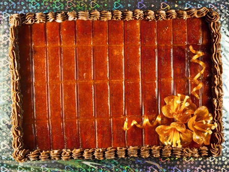 Details of a chocolate cake, decorated with sugar flower の写真素材