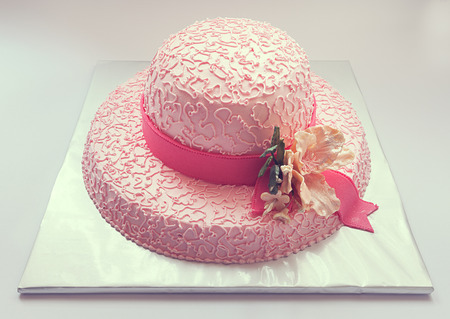Birthday cake, looks like hat in pink colorの写真素材