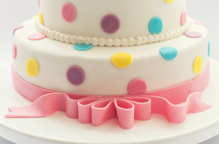 Details of a birthday cake, isolated on white background  の写真素材