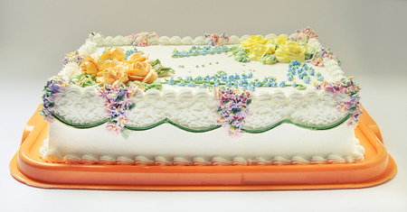 Classical birthday cake design with a lot of flowers of cream  の写真素材
