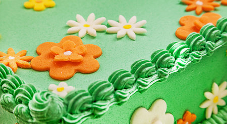 Details of birthday cake, symbolizes green field and summer time  