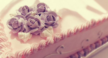 Birthday or wedding cake decoration, flowers and leafs of cream  の写真素材