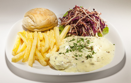 Meal for lunch served on white plate.の写真素材