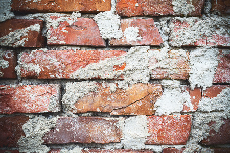 Texture of an old brick wall, closeup view on details.の写真素材