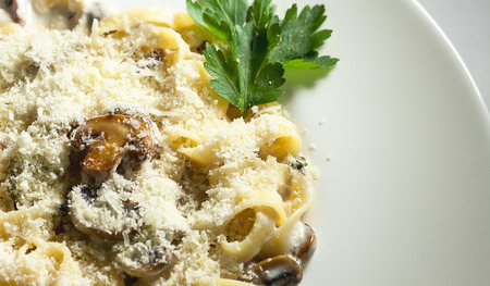Italian food, grilled mushrooms and pasta.の写真素材