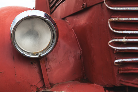 Old bus beacon details, red aged metal around it.の写真素材