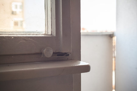 Behind the window, view on terrace entrance, old retro style.