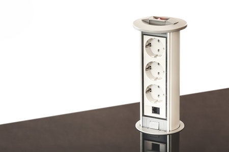 Electric plugs built in table, modern design and clever solution for saving room on table.