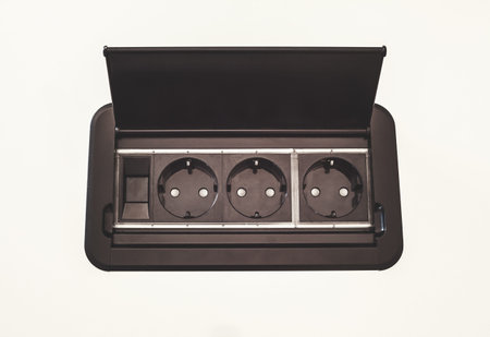Modern electric plugs built in table, clever solutions for saving space, and making cords invisible.の写真素材