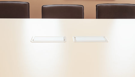 Modern electric power supply built in table good solution for office making cords invisible.の写真素材