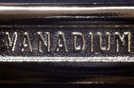 Written word on metal, part of industrial tool.の写真素材