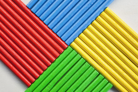 Abstract composition of wooden sticks in various vibrant colors.の写真素材