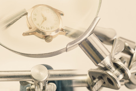 Service of watches view on an old retro watch magnified with the tool.の写真素材