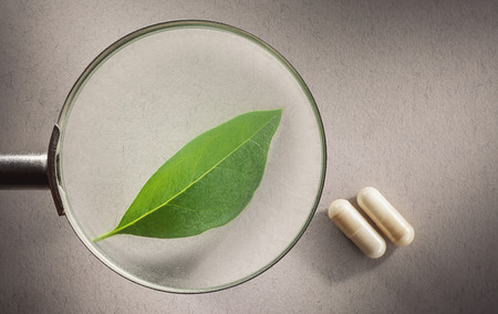 Conceptual composition presenting medicine science relation between natural and chemical.の写真素材
