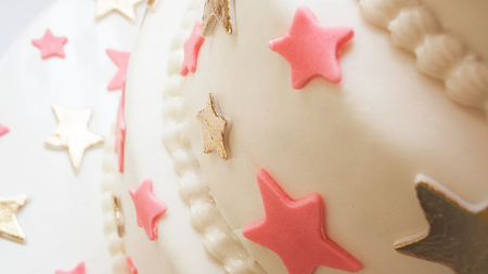 Birthday cake decorated with stars made of sugar.の写真素材